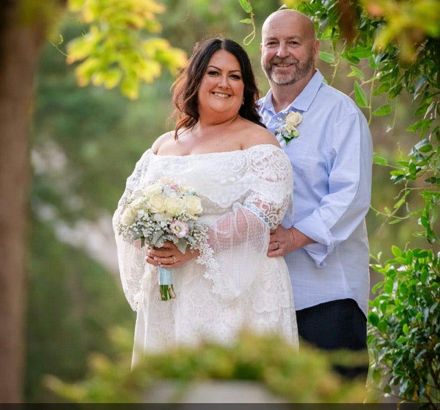Bridal bouquet with roses, seasonal florals and fresh foliage, handcrafted by Emflowerment for Croydon weddings.