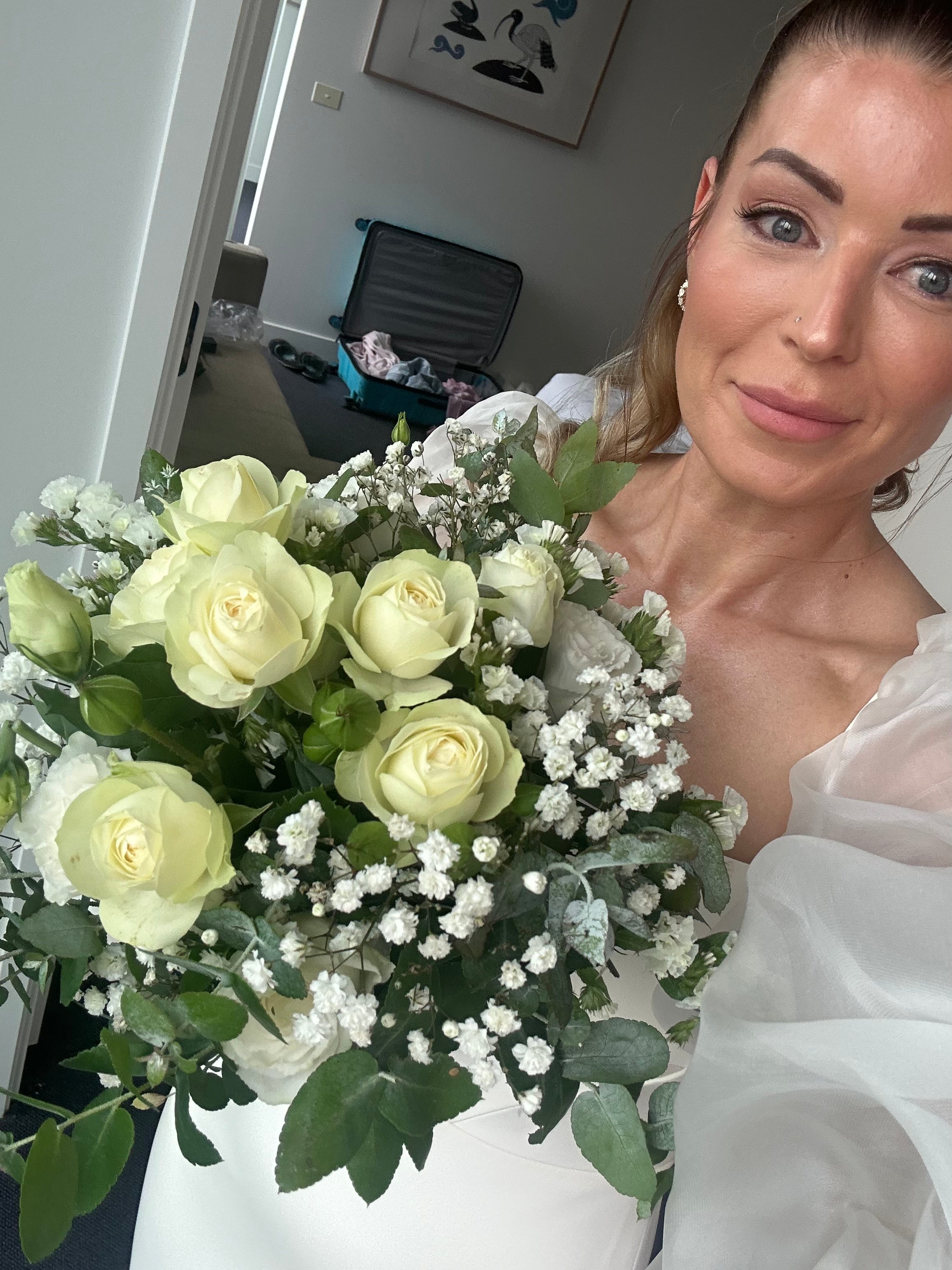 Bridal bouquet with roses, seasonal florals and fresh foliage, handcrafted by Emflowerment for Croydon weddings.