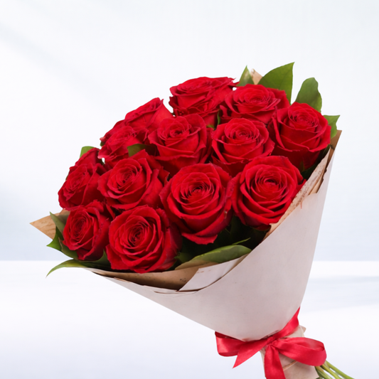 Valentine’s Day bouquet available in red roses, wrapped with greenery, approximately 40cm in length, with options for 6, 12 or 24 roses.