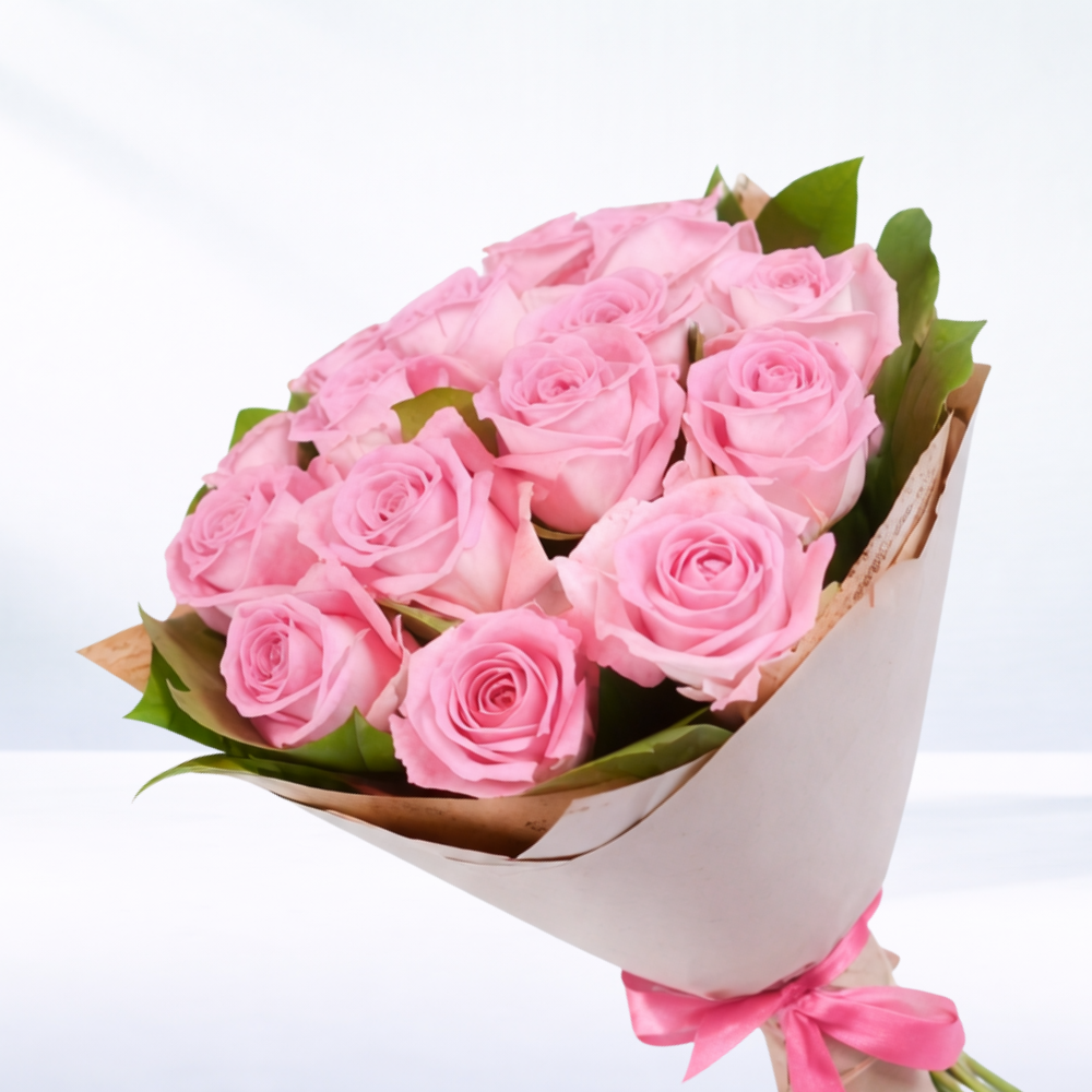 Valentine’s Day bouquet pink roses, wrapped with greenery, approximately 40cm in length, with options for 6, 12 or 24 roses.