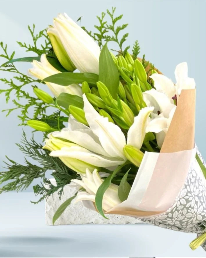 Bouquet of white lillies from emflowerment croydon for same day delivery