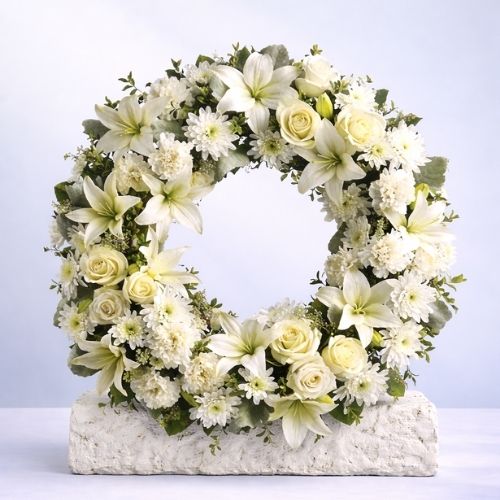 Funeral wreath created by Emflowerment Florist Croydon, designed for memorial services and celebration-of-life tributes.