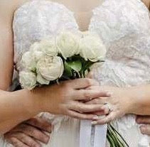 Classic white wedding bouquet with premium blooms and elegant greenery, perfect for modern and traditional ceremonies.